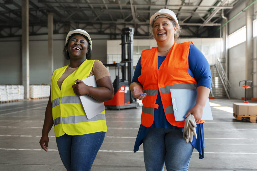 Two women inspecting a site as part of safety management