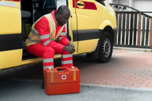 Man with his car first aid essentials