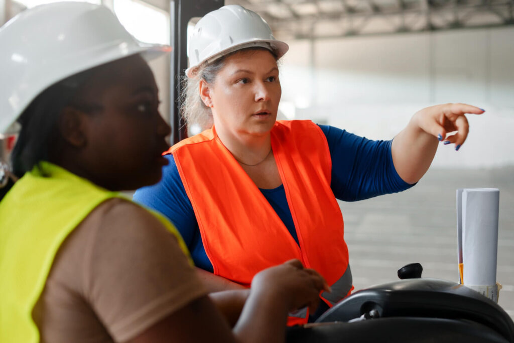 a Health and Safety Practitioner helping a college