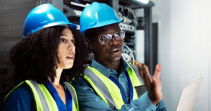 An inspector conducting ohs legal compliance assessment.